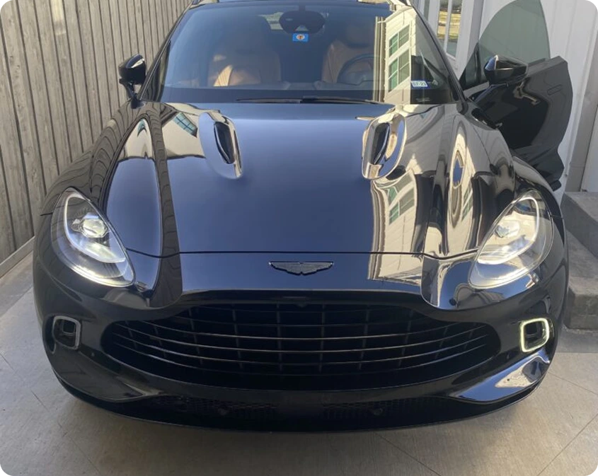 Mobile car detailing technician at work